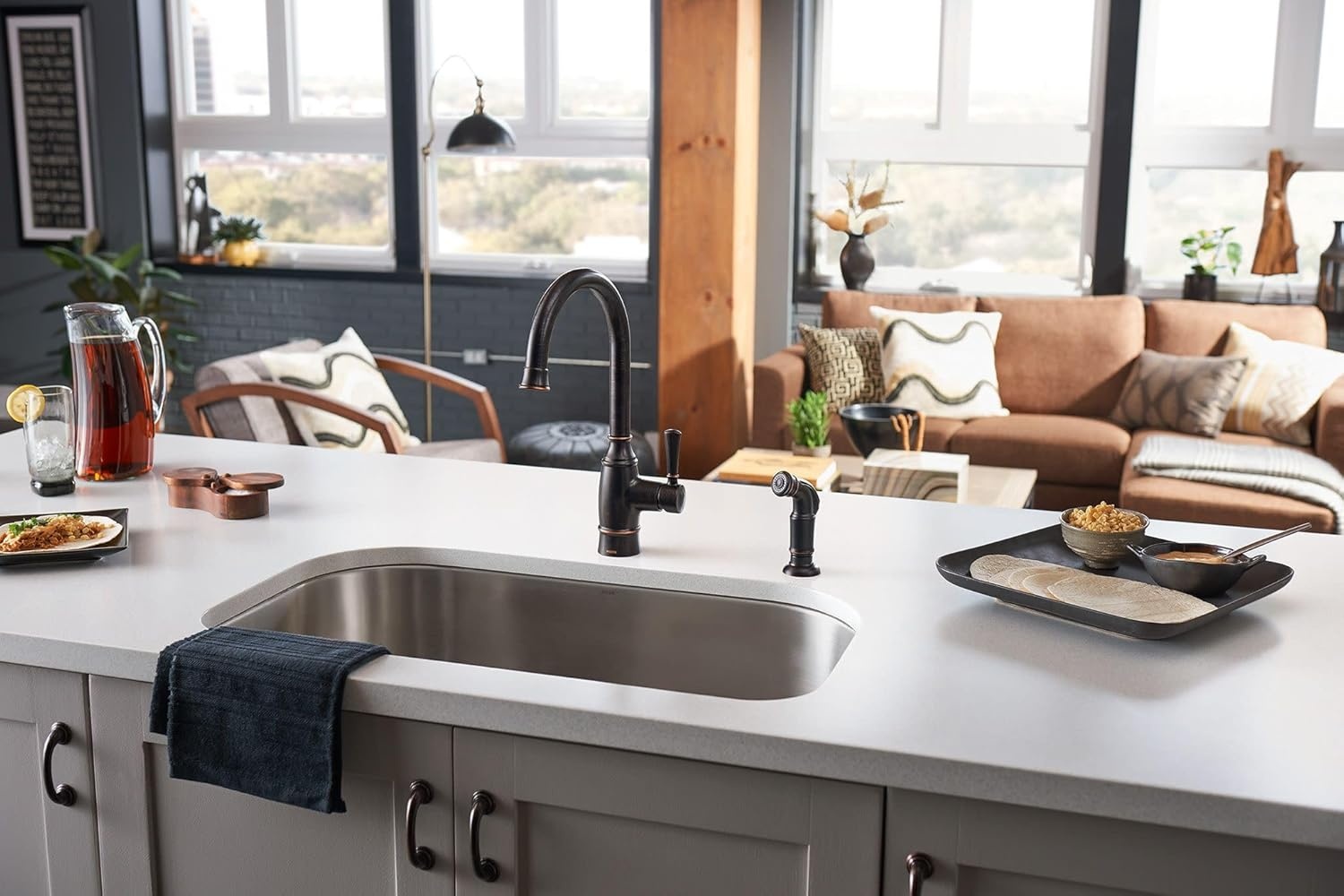 image:imageMoen Noell 1Handle Kitchen Faucet with Side Sprayer 87506BRB Singlehandle faucet Side sprayer included Deckmounted installation Mediterranean bronze finish Kitchen sink faucet