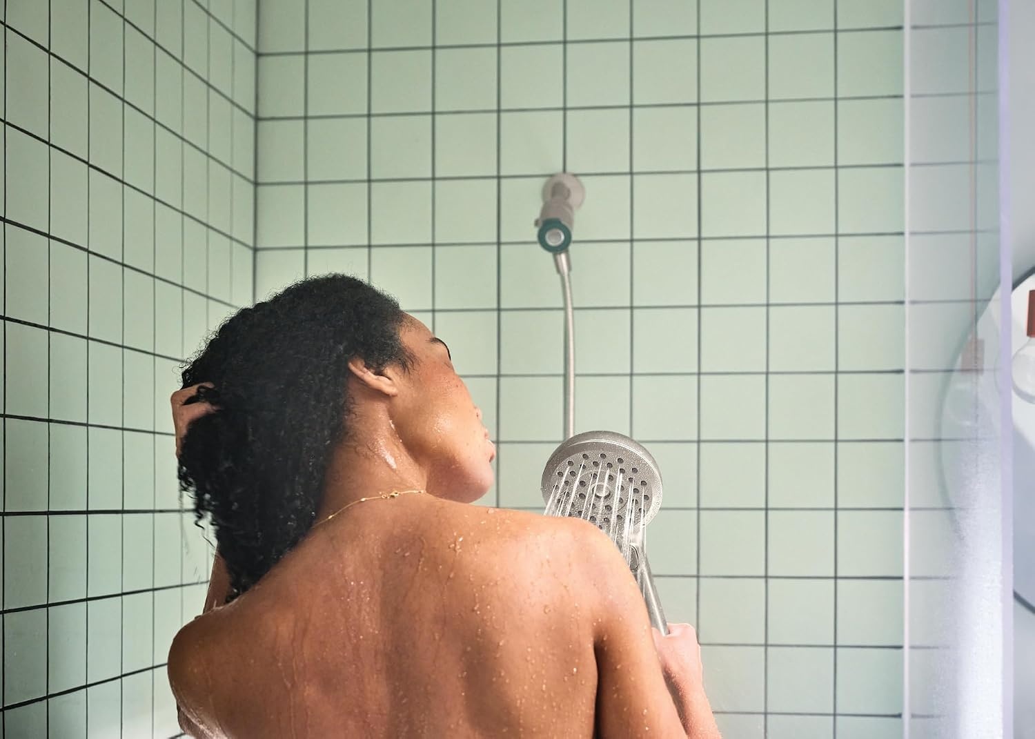 image:imageMoen Verso Handshower Detachable Round Shower Head with Magnetix Docking System 60 Hose Matte Black 220H2BLSpot Resist Nickel