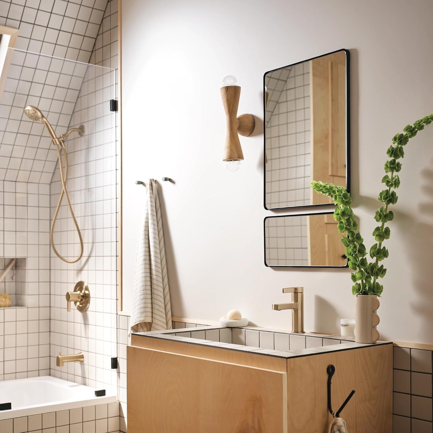 image:imageMoen 82775BL Beric SingleHandle Tub and Shower Faucet with Handshower and Metal Hose Valve Included IPS Tub Spout Matte BlackBronzed Gold
