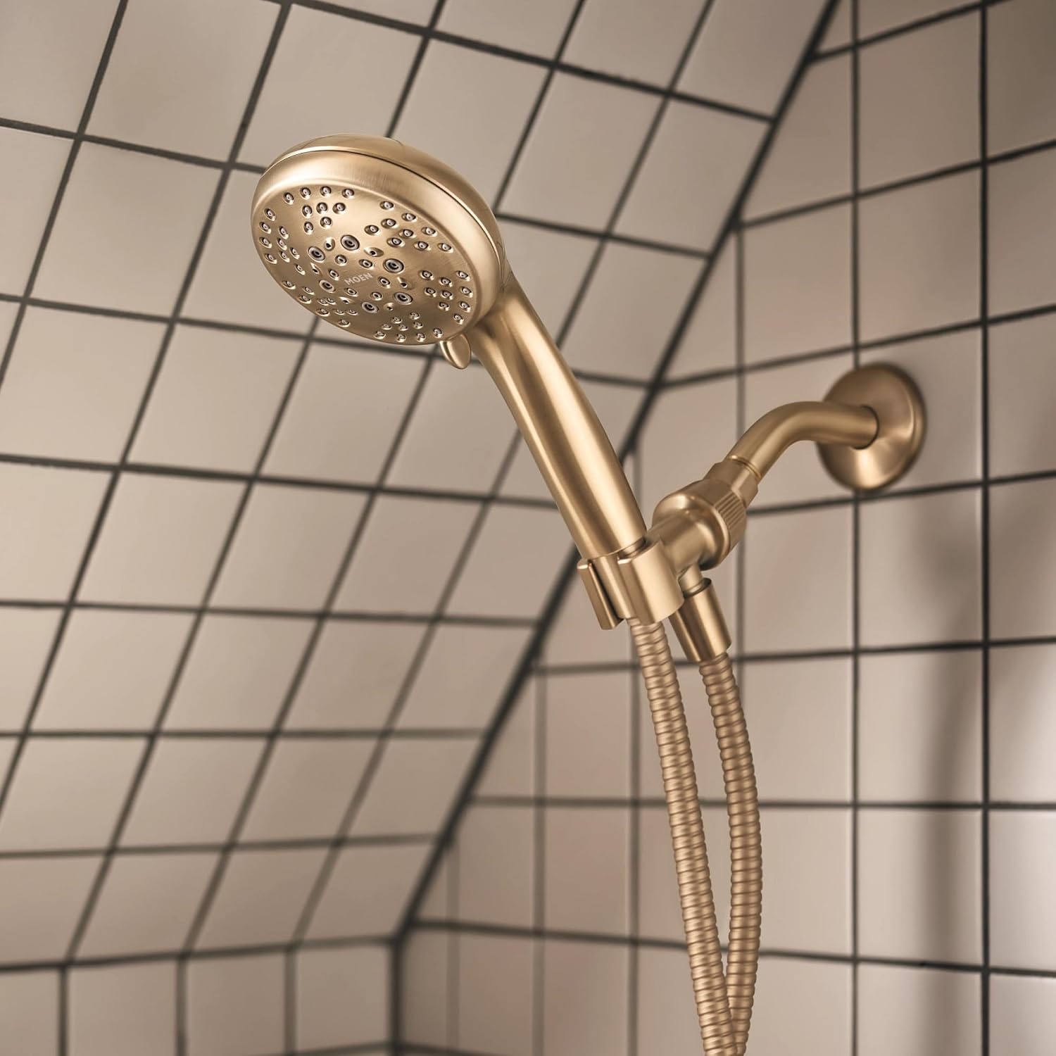 image:imageMoen 82775BL Beric SingleHandle Tub and Shower Faucet with Handshower and Metal Hose Valve Included IPS Tub Spout Matte BlackBronzed Gold