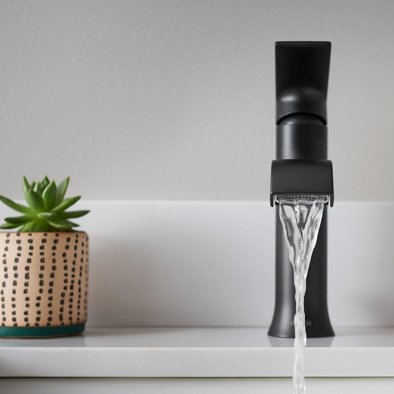 image:imageMoen Genta LX Matte Black OneHandle Modern Bathroom Sink Faucet with Optional Deckplate and LowArc Spout for Bath Countertop 6702BLMatte Black